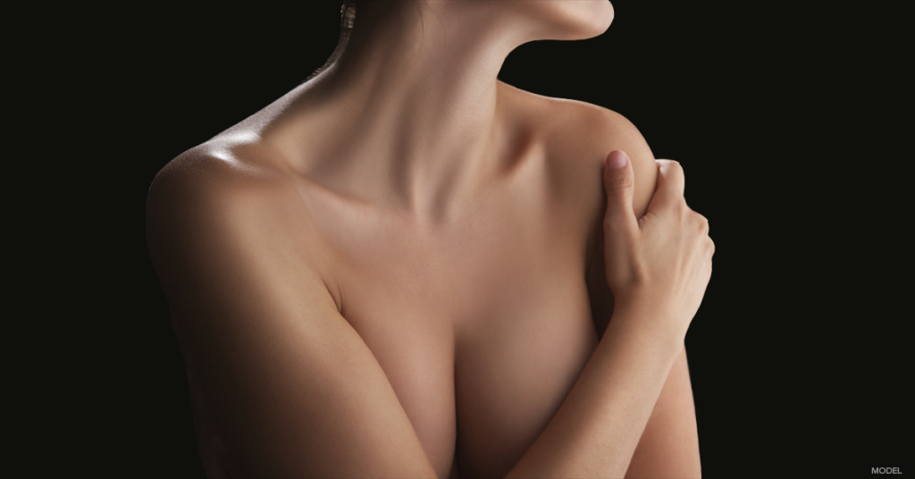 Woman better understanding breast implant safety before her breast augmentation.